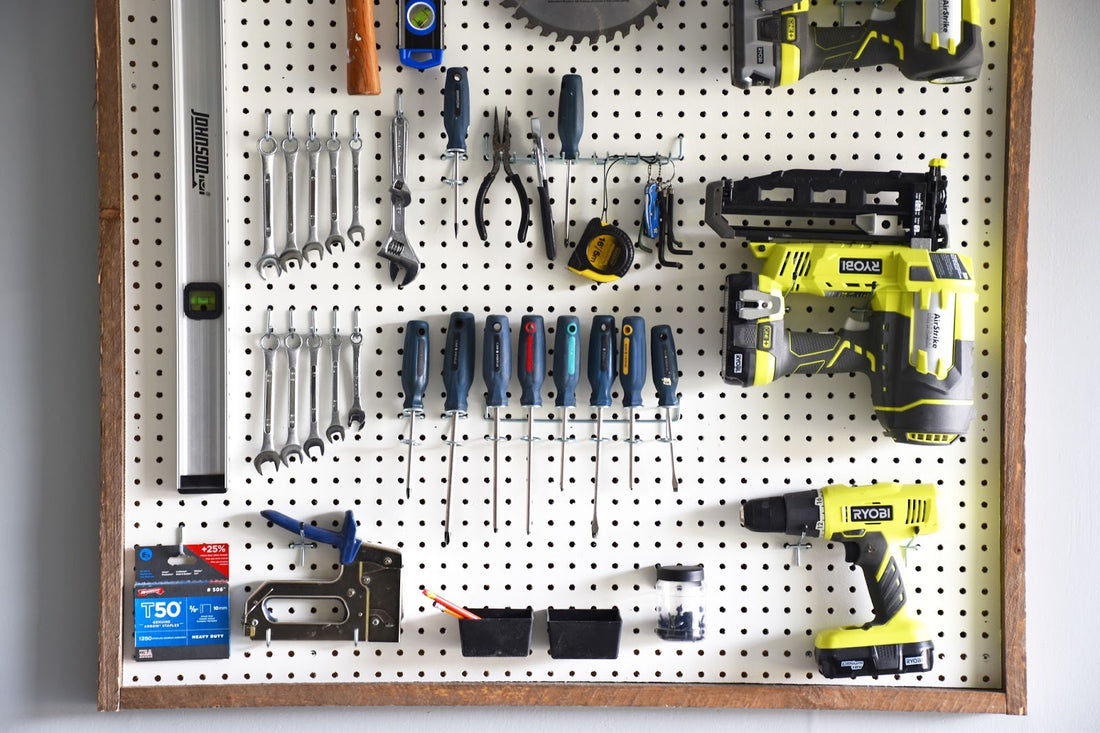 Organised tools on a peg board 